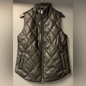 TODAY***$29***NWOT Chico’s black quilted faux leather vest.